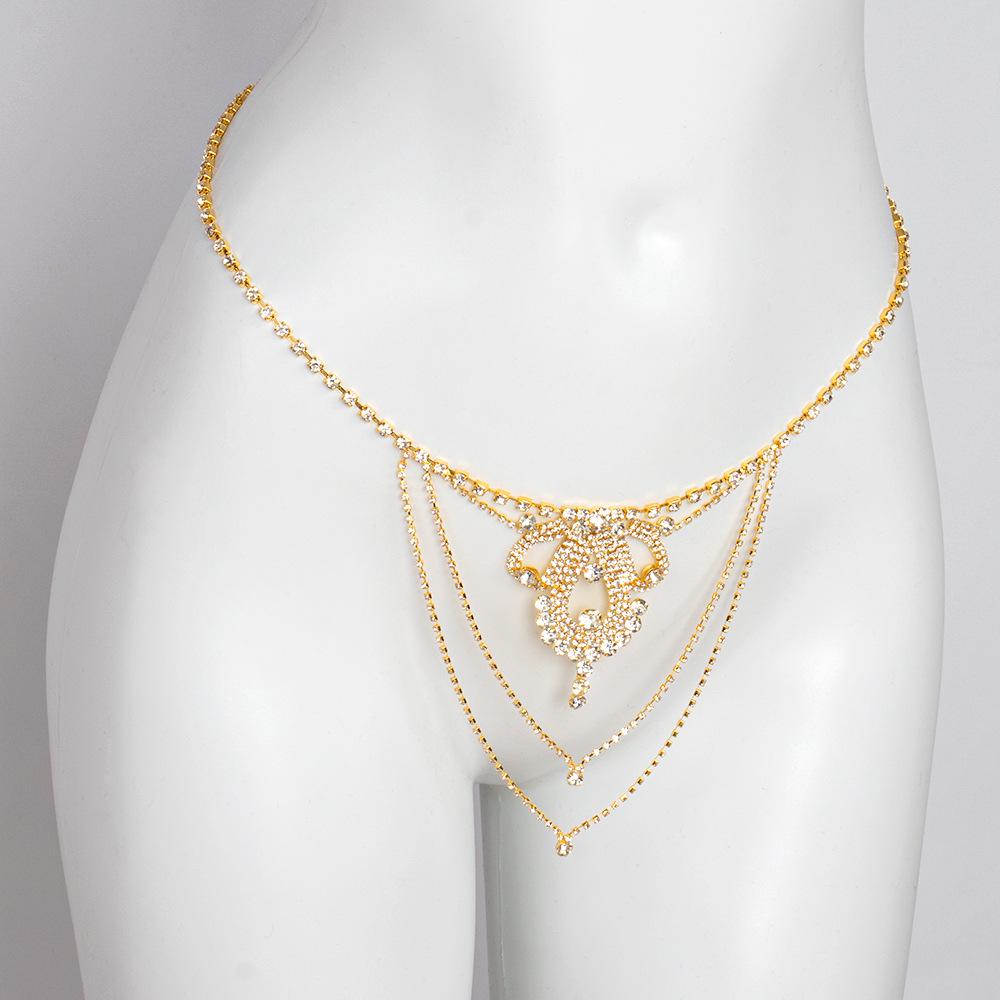 

Гламурный набор стринги со стразами и цепочка для тела золотой