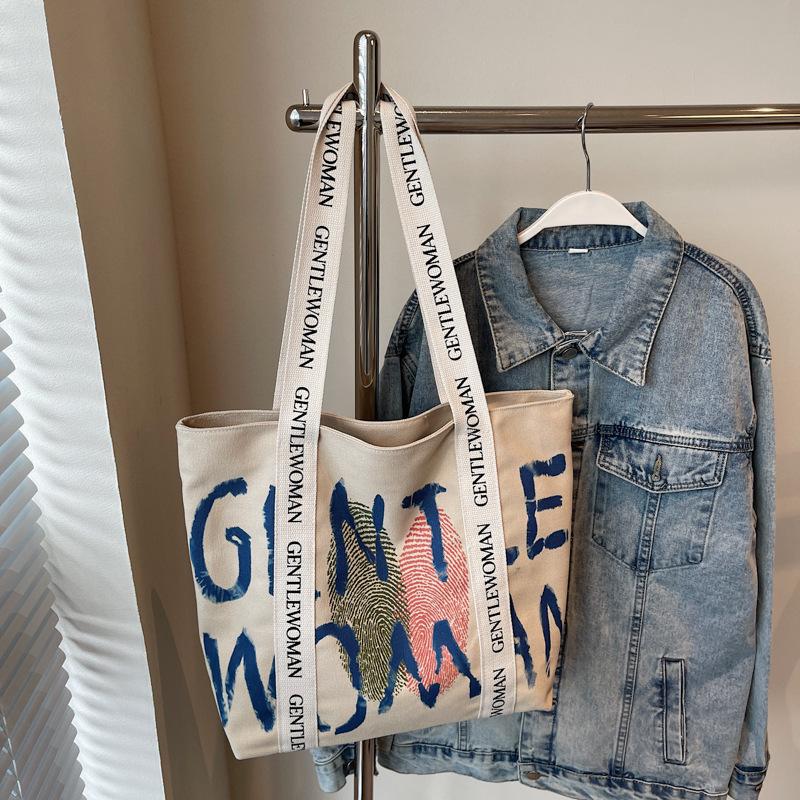 Canvas bag women's 2025 new shoulder bag casual large-capacity Korean version student schoolbag literary and leisure handbag bag