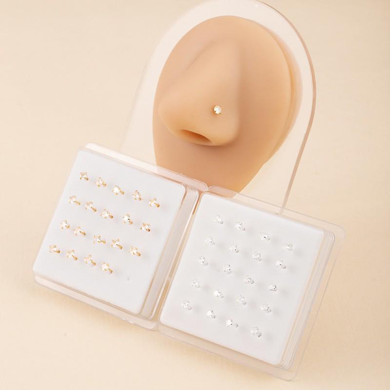 Set alla moda da 20 pezzi di borchie e anelli per naso in zircone con intarsio in rame per uomo e donna