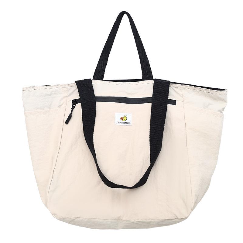 

New shoulder nylon business trip leisure fashion commute lazy wind travel bag lightweight large capacity tote bag One Size