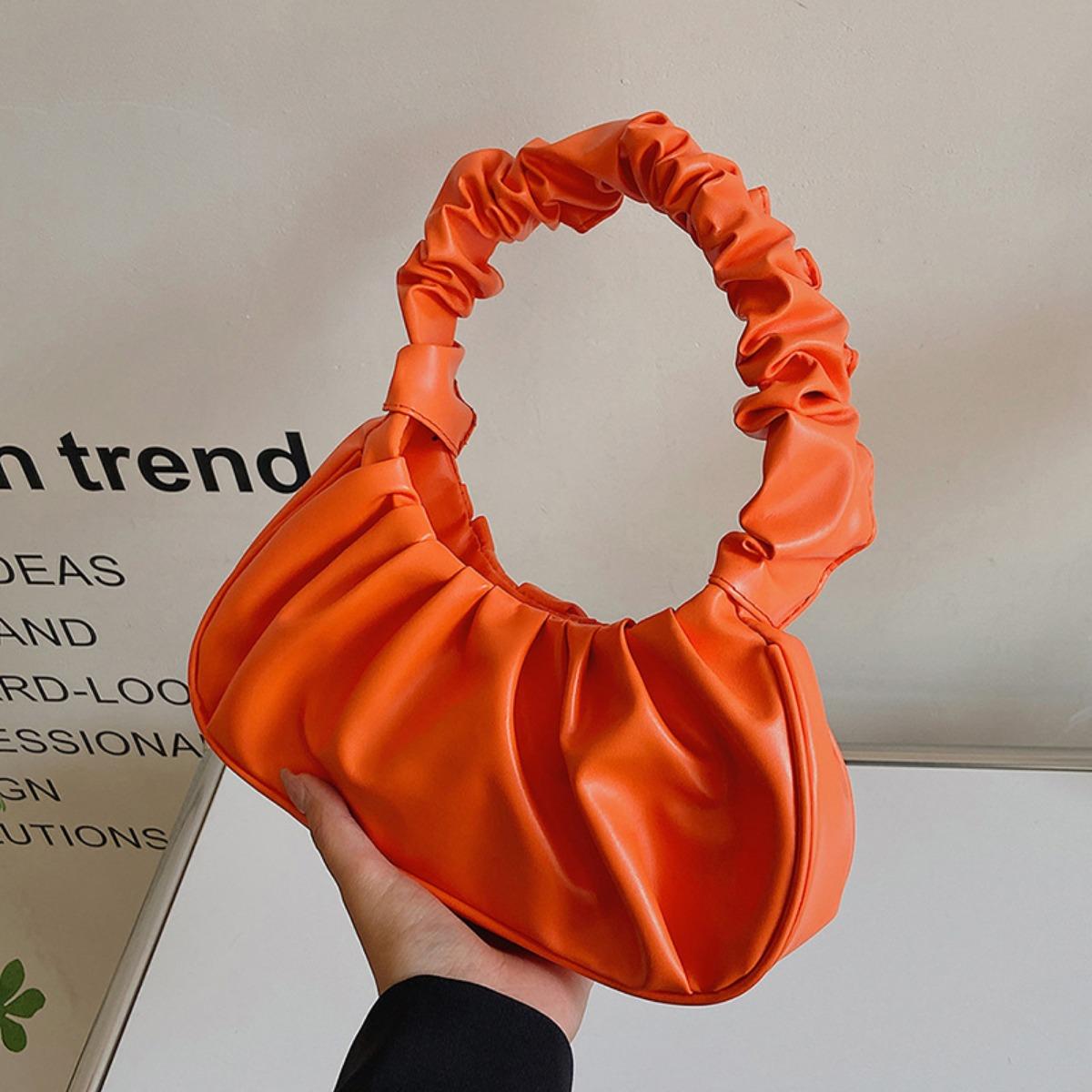 

Корейская версия женской сумки однотонная облачная плиссированная сумка простая женская сумка подмышку милая сумка через плечо оранжевый