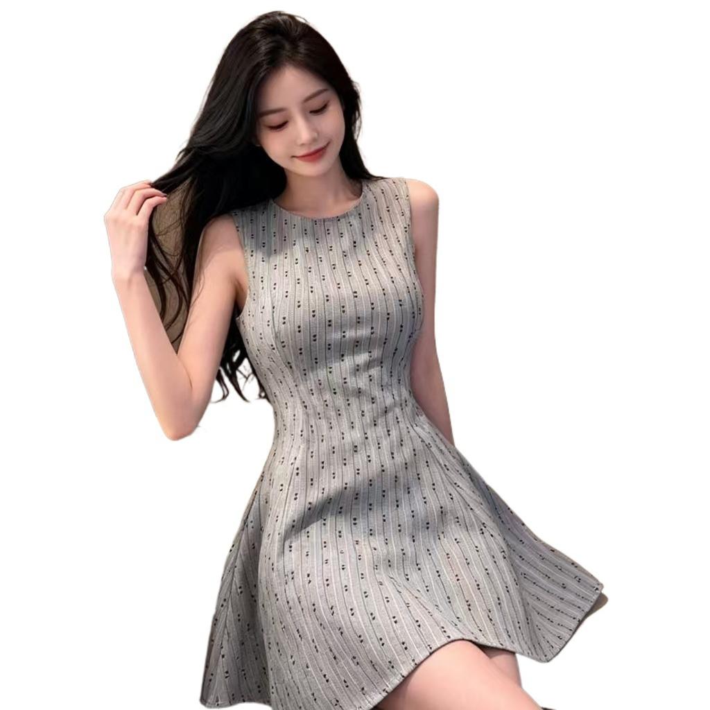 Crew neck sleeveless printed vest dress niche French commuter sexy high waist fluffy and thin A-shaped short skirt