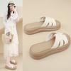 Retro French one-word slippers women's summer wear 2025 new heightening flat-bottomed seaside vacation sandals casual sandals