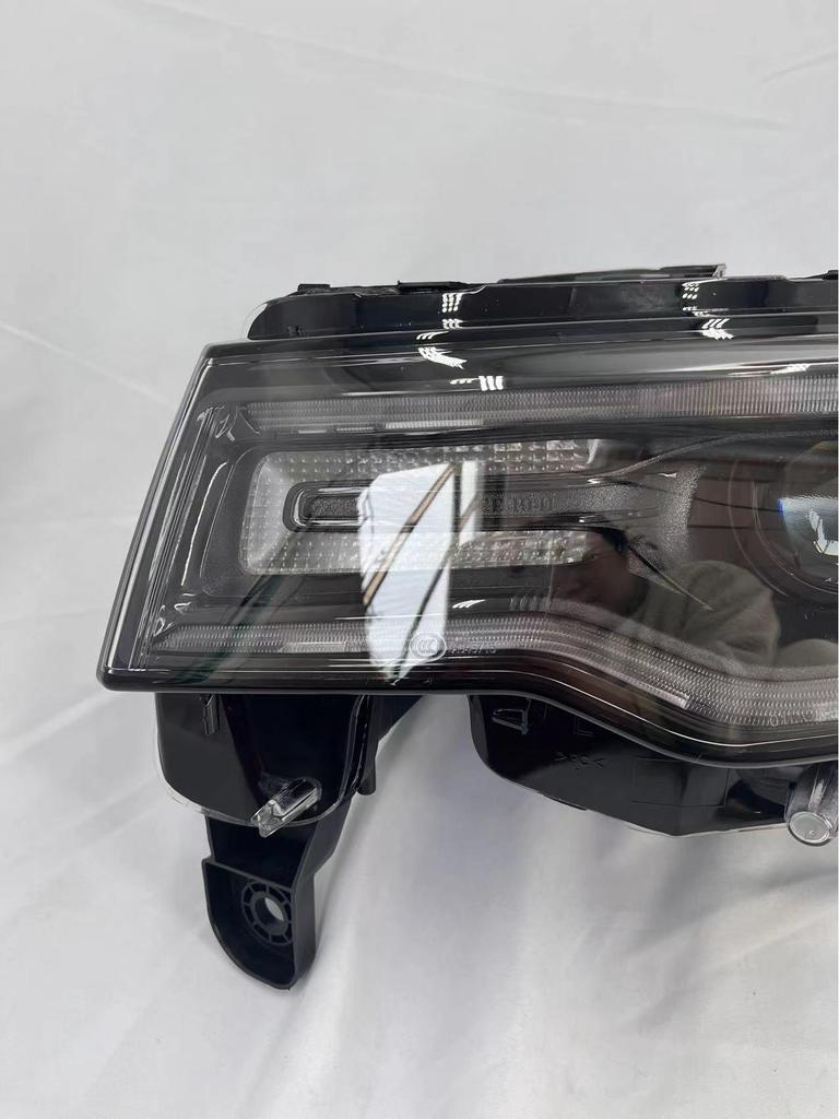 Fits 2014-2018 Jeep Grand Cherokee: OEM Headlight Half Assembly with Low Beam Lighting