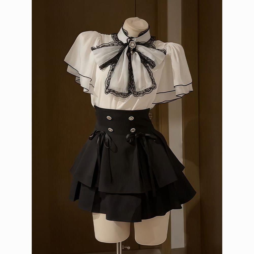Completo due pezzi: Top in chiffon giapponese con maniche a tromba e gonna estiva attillata