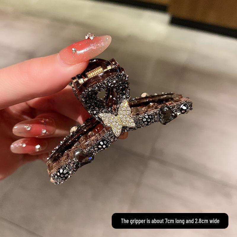 

Элегантная высококачественная шпилька для волос для женщин - зажим в форме акулы среднего и маленького размера для челок и высоких причесок, аксессуар для волос из коллекции 2023 года.