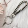 Gevlochten Lederen Touw Sleutelhanger met Poppenhanger - Modieus en Creatief Accessoire