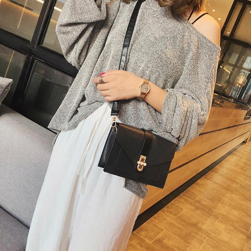 small black bolsa designer