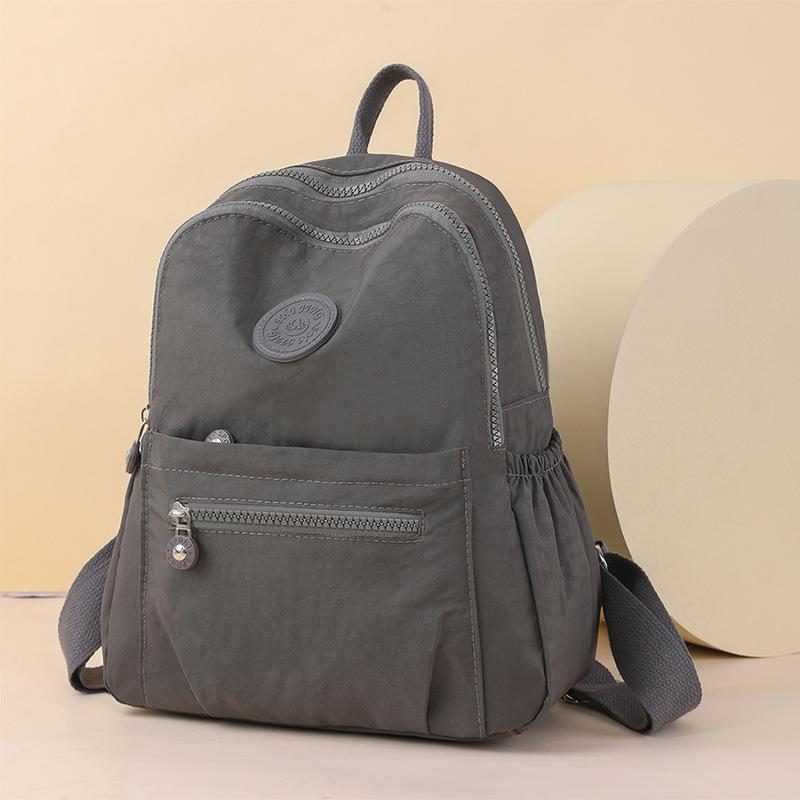 Tykket nylon oxford klut ryggsekk kvinners vanntett reiseryggsekk med stor kapasitet Lett reiseveske