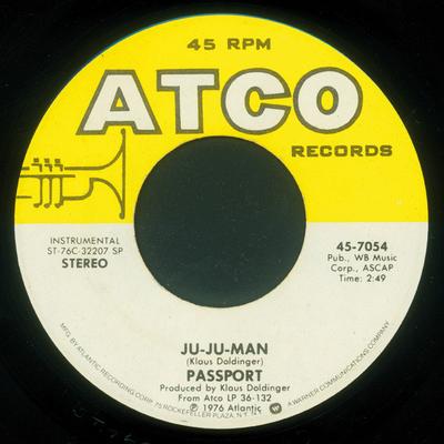 7-inch Plaat PASSPORT - Ju-Ju Man / Infinity Machine 457054 ATCO Records 1976 VK Dans & Electronica Gebruikt