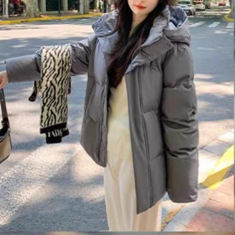 Gelbe Daunen-Baumwoll-gepolsterte Kleidung mit Kapuze für Damen Winter neue lockere und verdickte kurze Baumwoll-gepolsterte Kleidung für kleine Schülerinnen