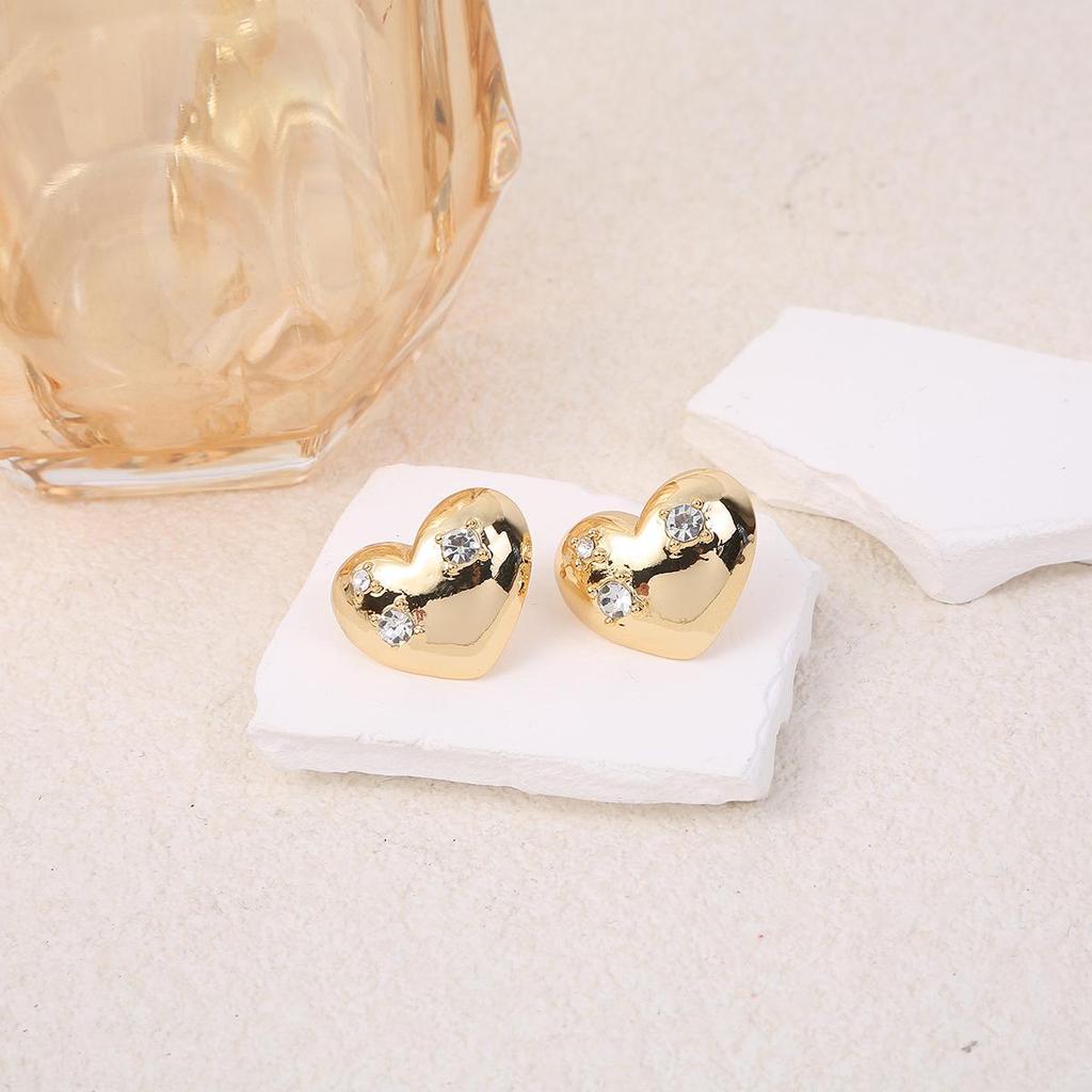 Gold Heart Hollow Earrings - Niche Design, High-End Cold Style, Small Studs