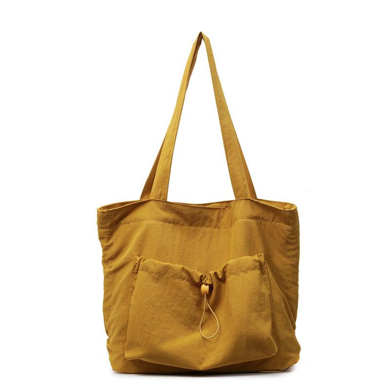 

Fashion drawstring handheld cloth bag women s large-capacity simple casual shopping shoulder bag lightweight student class bag one size fits all жовтий