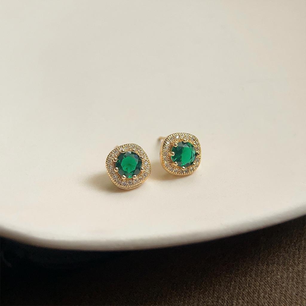 

Изумрудные серьги-пусеты в стиле ретро середины века