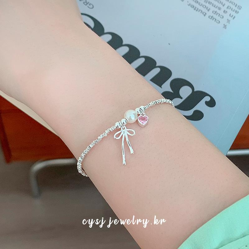Cui Yan S925 Sterling Silver Korean Bow Bracelet with Pearl Flakes - Elegant and Sweet Design for Women