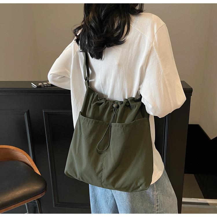Soft Nylon Vertical Shape Shoulder Bag With Flap Closure For Daily Outings