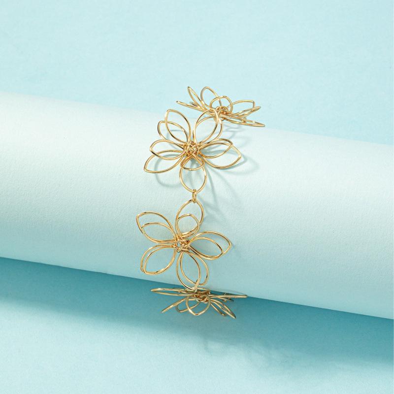 Retro Geometric Metal Flower Bracelet for Women - High-End Woven Jewelry