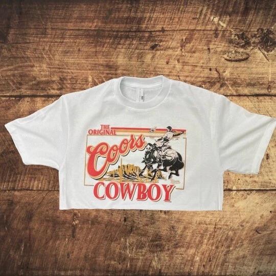 

Coors Beer Cowboy Women s Short Sleeve Crop Top | Western Fashion Sizes S-XL 4XL