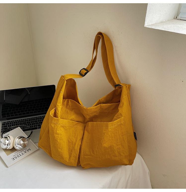 

Large-capacity casual commuter bag, women s 2025 new simple canvas shoulder bag, high-end casual tote bag жёлтый