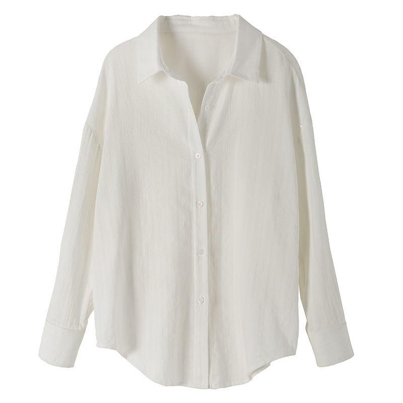 Chemise en coton blanc à manches longues pour femmes Au printemps et en automne Design polyvalent ample et élégant Haut de niche