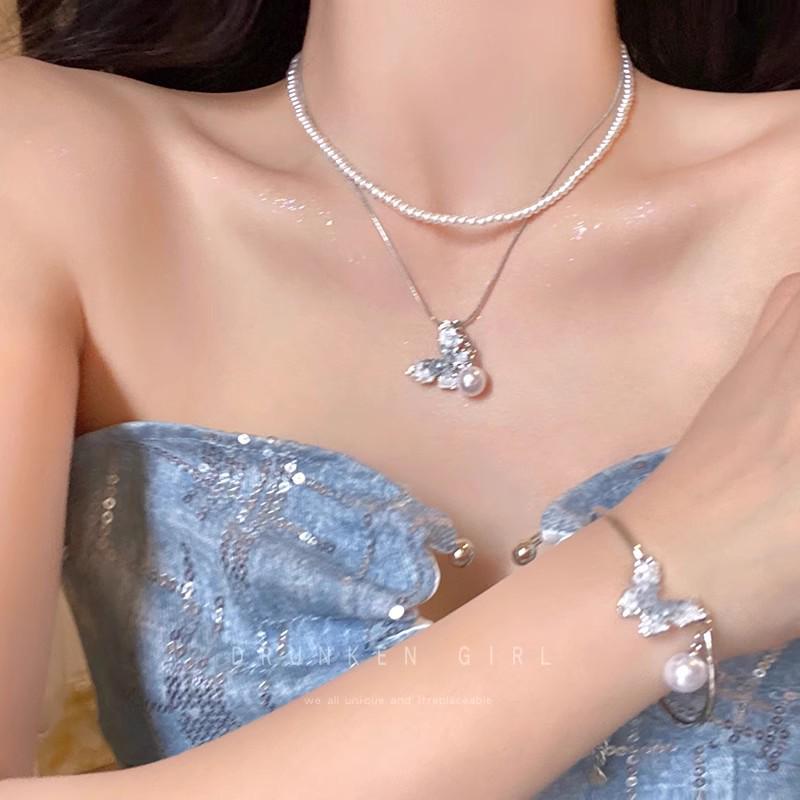 Elegant Stacked Pearl Necklace for Women - High-End Autumn/Winter Accessory with a Stylish Sweater Chain Design