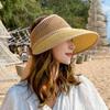 A Summer Essential: a Lovely Straw Sun Hat for Your Vacation Look.