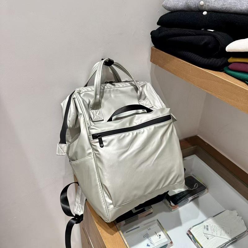 Značka módního návrháře Dámský a pánský batoh Trendy styl Taška na notebook 15,6 palce PU kůže Businessový ruksak Dámská školní taška