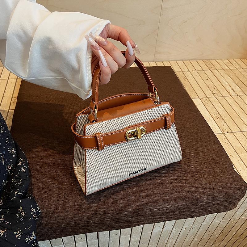 Commuter large-capacity canvas bag women's 2025 new popular and popular versatile messenger bag fashion contrasting handbag