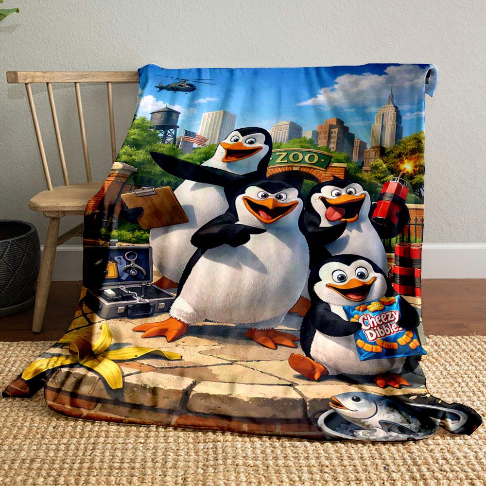 Animated penguins with tools and snacks in front of a zoo and city skyline. for all seasons blanket lunch break throw gift