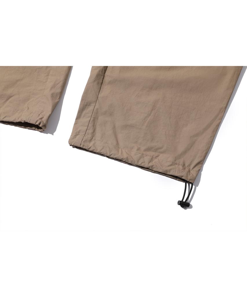 CPGN STUDIO Weite Cargohosen Beige