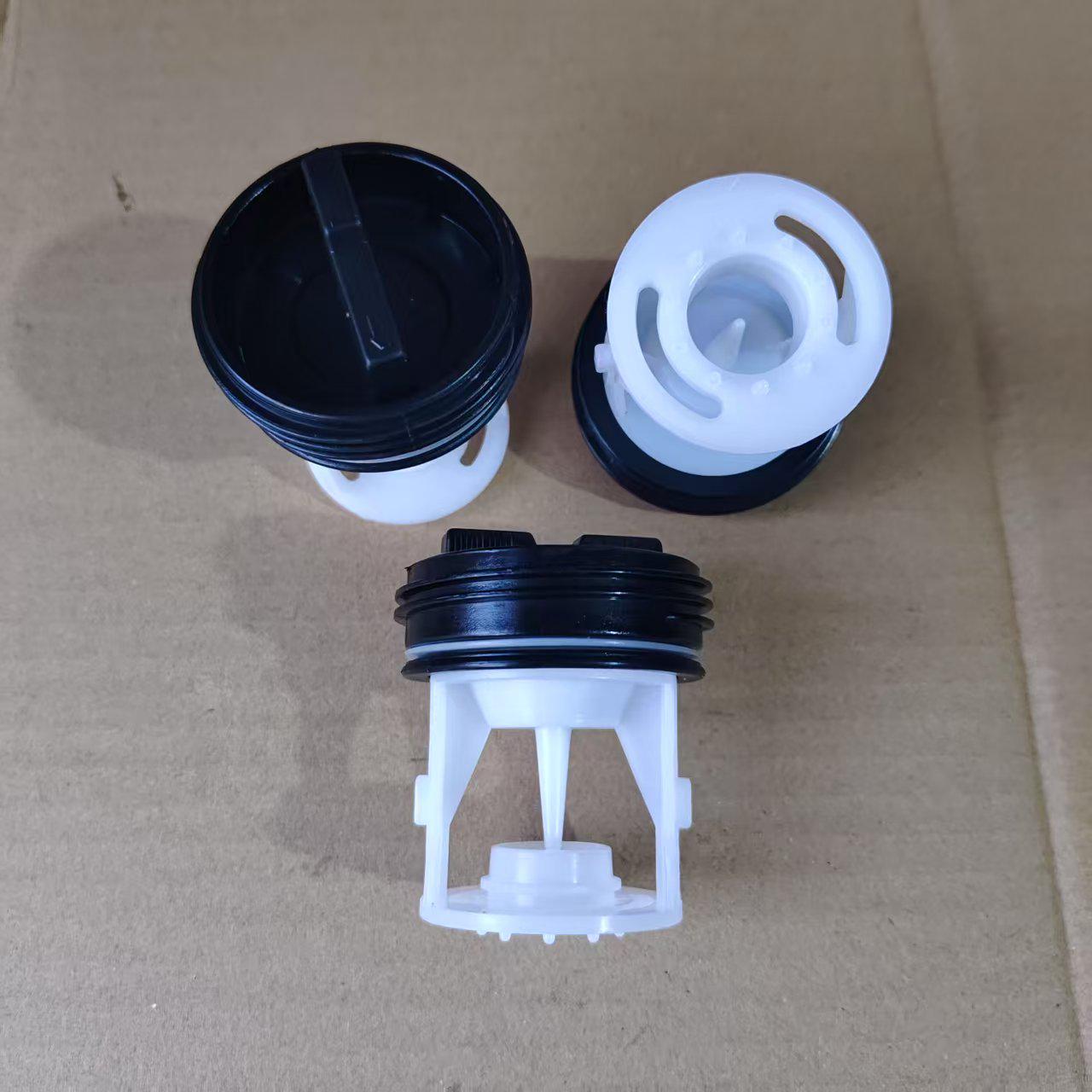 

Крышка и фильтр сливного насоса стиральной машины