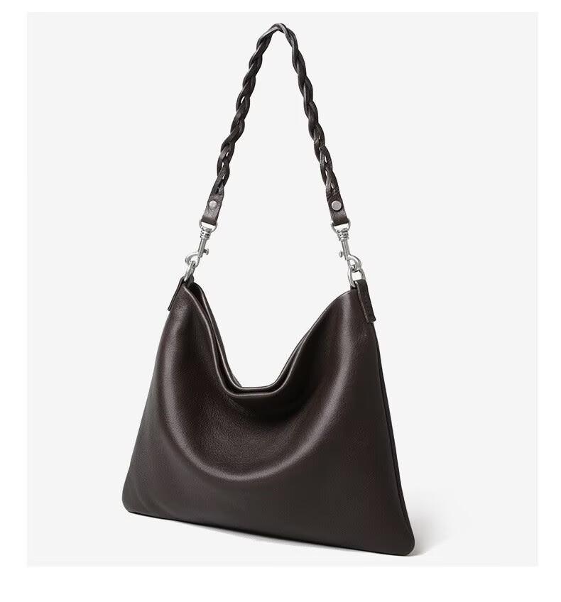 

Bag high-end cowhide large bag portable simple commuting niche large-capacity bucket first layer single shoulder woven belt bag women темно-коричневого