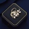 Exquisite Cat's Eye Swan Brooch: Elegant Women's Pin for Suits and Lapels, Enhancing Fashion with Personality.