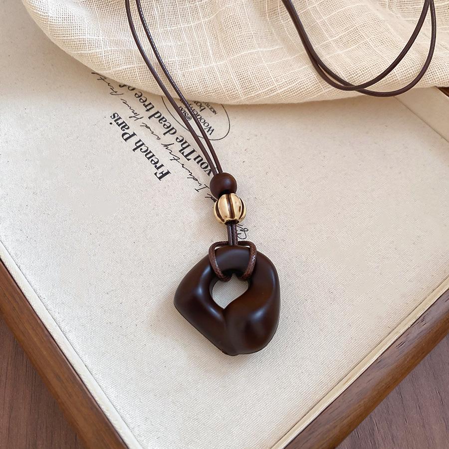Vintage Resin Wood Pendant Necklaces for Women Brown Irregular Hollow Square Sweater Chain Adjustable Rope Neck Chain Jewelry F