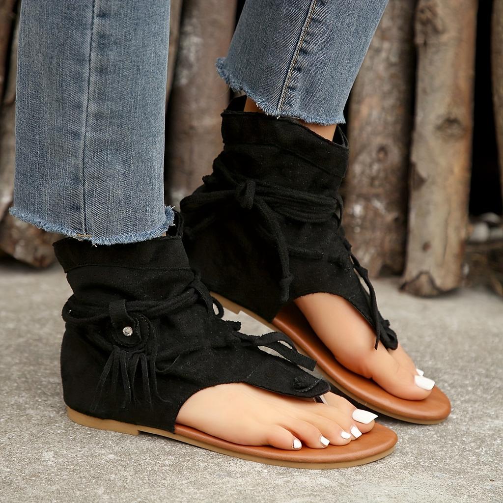 Sandalias retro de moda: cómodas sandalias retro para mujer, botas modernas de estilo transfronterizo, de suela plana con borlas y punta hueca, muy vendidas en Europa y América.