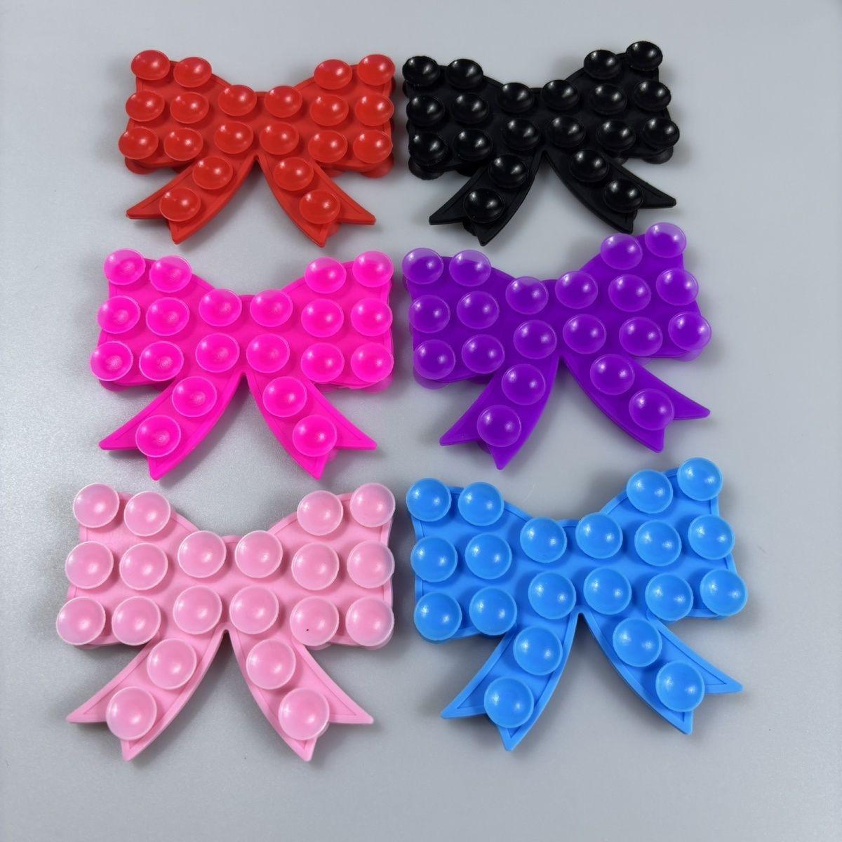 

Universal Bowtie Silicone Phone Suction Cup Holder - Portable & Self-Adhesive розовый