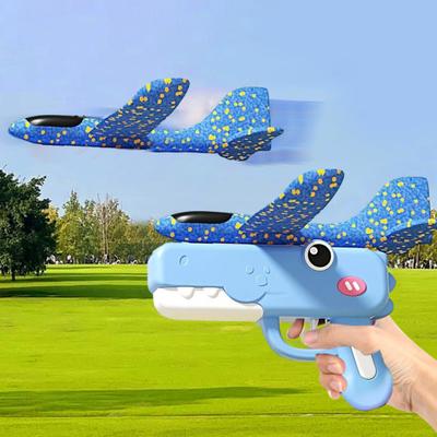 Lansator de Avioane din Spumă Portabil cu Design de Dinozaur Jucărie Zburătoare de Exterior pentru Copii Raza 8-15m Ușor Cadou Distractiv pentru Băieți Fete