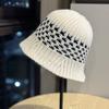 Korean-style solid color knitted hollow fisherman hat for women, new breathable sun protection hat for spring and summer