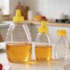 Transparent Reusable Plastic Honey Bottles Squeeze Honey Bottle Container Holder With Lid For Storing And Dispensing Honey Jar