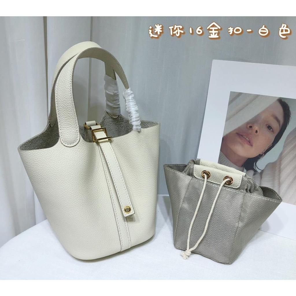 Spot wholesale top layer cowhide vegetable basket bag leather bucket bag commuter fashion lock buckle hand-held handbag woman