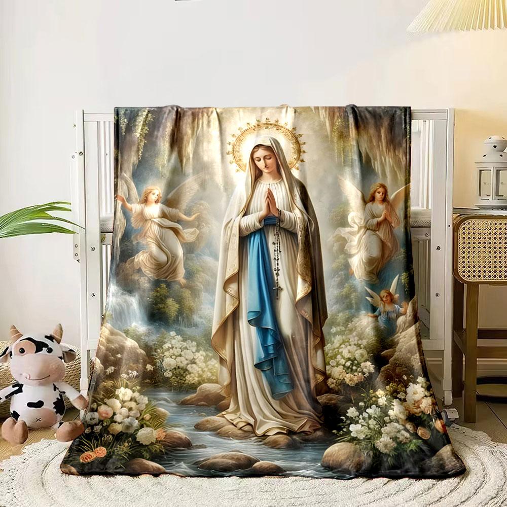 

A serene figure in robes with a halo, surrounded by angels and nature. for all seasons blanket lunch break throw gift 80cm x 120cm