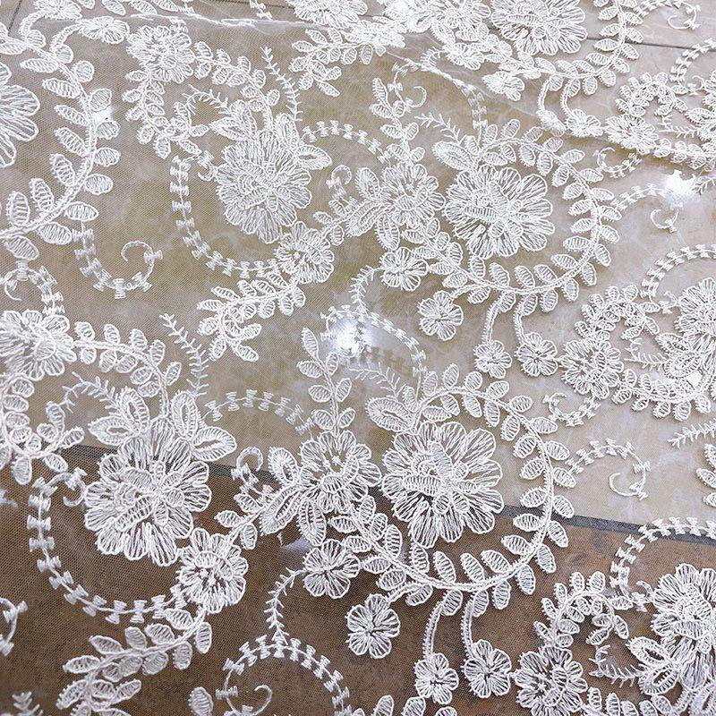 Embroidered Lace Fabric with Flower-like Patterns Suitable for Wedding Dresses Formal Gowns and Designer Clothing Fabrics