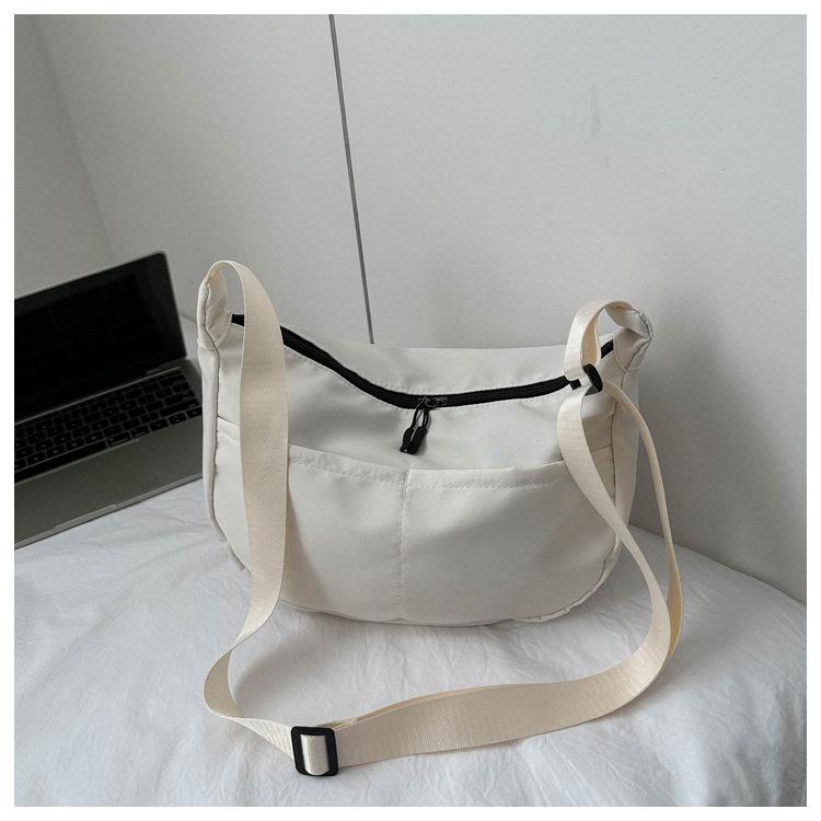Spring new fashionable versatile solid color messenger bag casual simple dumpling bag street trend large capacity schoolbag