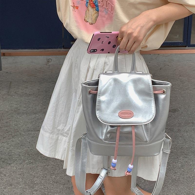 

Серебряный женский повседневный рюкзак: Летняя школьная сумка-мессенджер и сумка через плечо 2025 года серебряный
