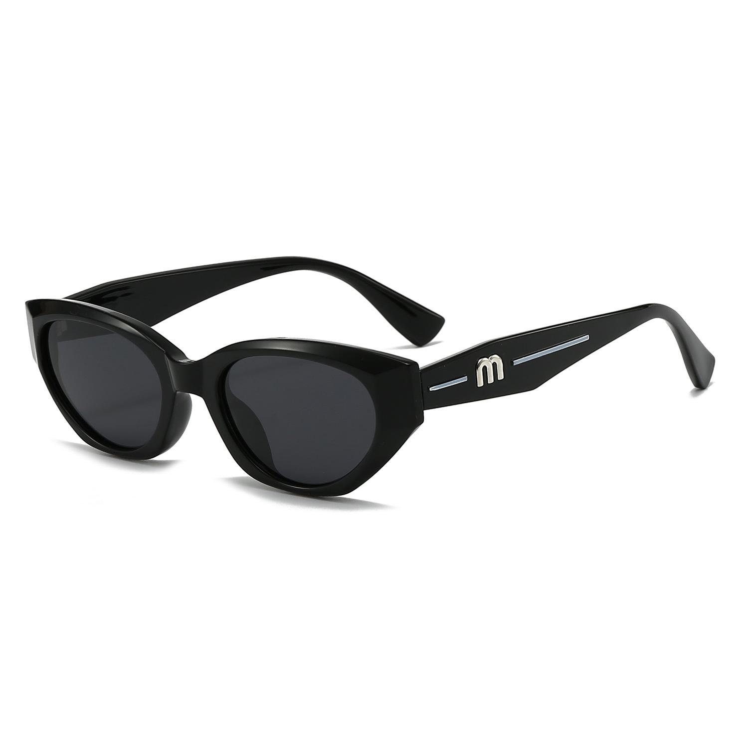 

New polarized TAC personality Joker UV sunglasses Cat s eye fashion advanced street shooting UV outdoor driving mirror. чорний