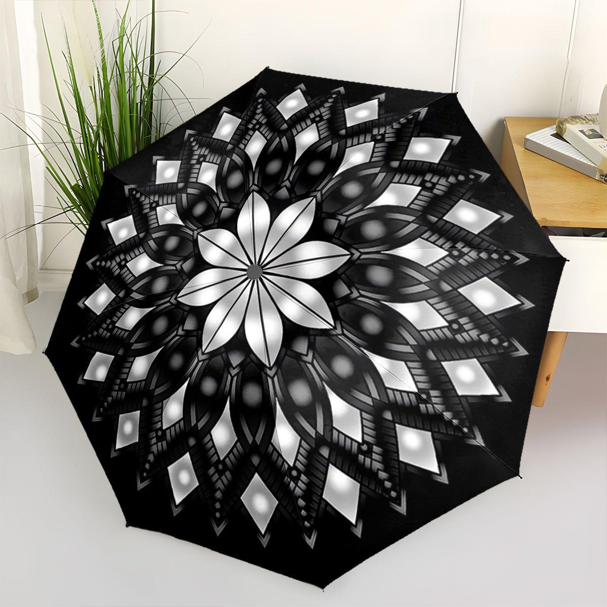 

A Folding Umbrella with a Geometric Mandala Pattern. It Features a Portable And Collapsible Design, Making It a Casual Outdoor Iron&8K