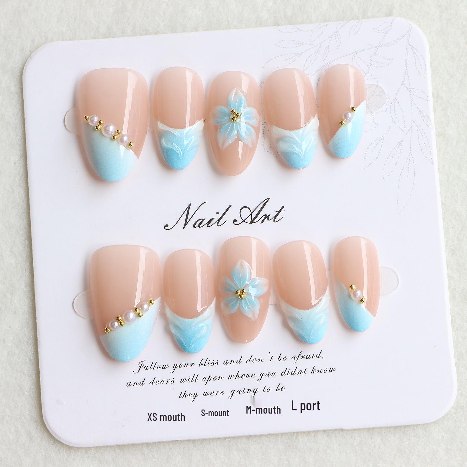 Flashy Almond-shaped Cat Eye Nails with Rhinestones & 3D Embossed Glacier Flower Design