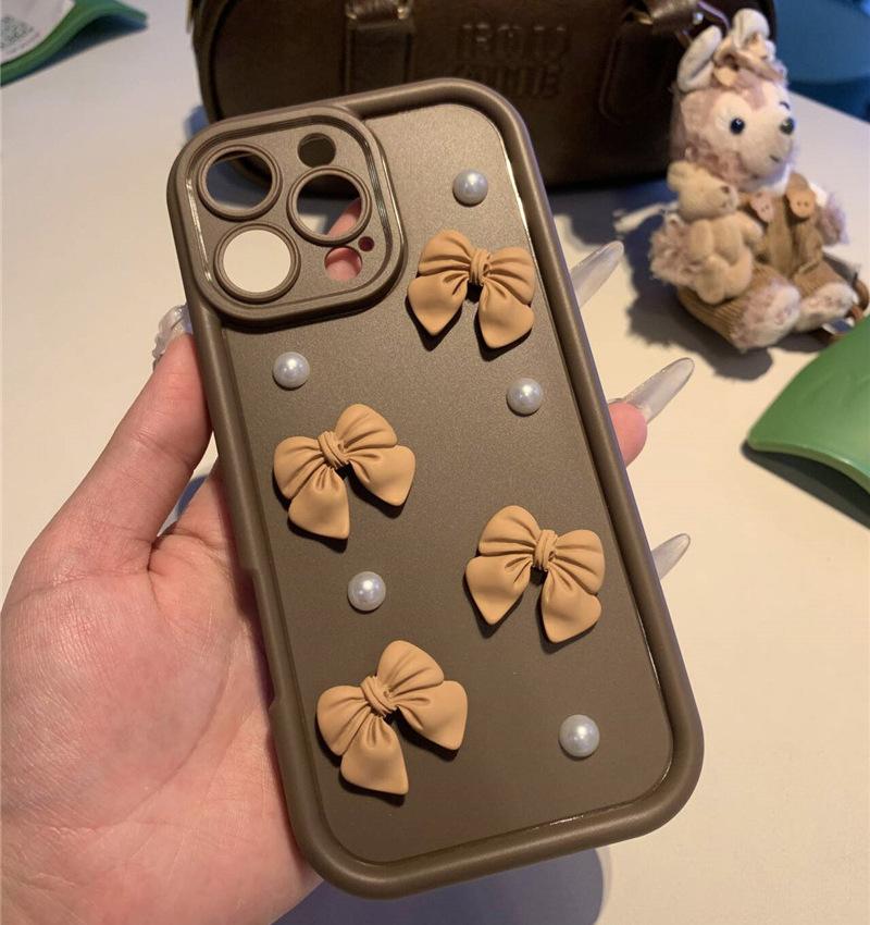 Applicable to iPhone17 matte mobile phone case female pearl bow Apple 16Promax protective case 1514 new model