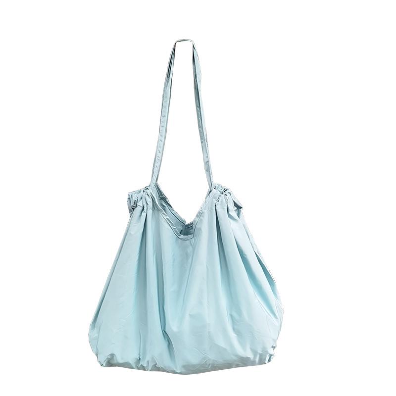 Eco-Friendly Foldable Shopping Tote with Buckle, Drawstring Closure, and Single Shoulder Strap