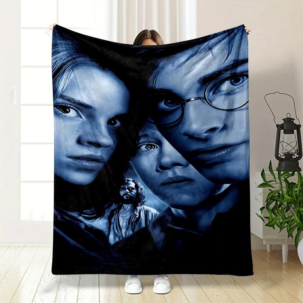 Dark, blue-toned portrait with sharp contrast and partial face visibility. for all seasons blanket lunch break throw gift